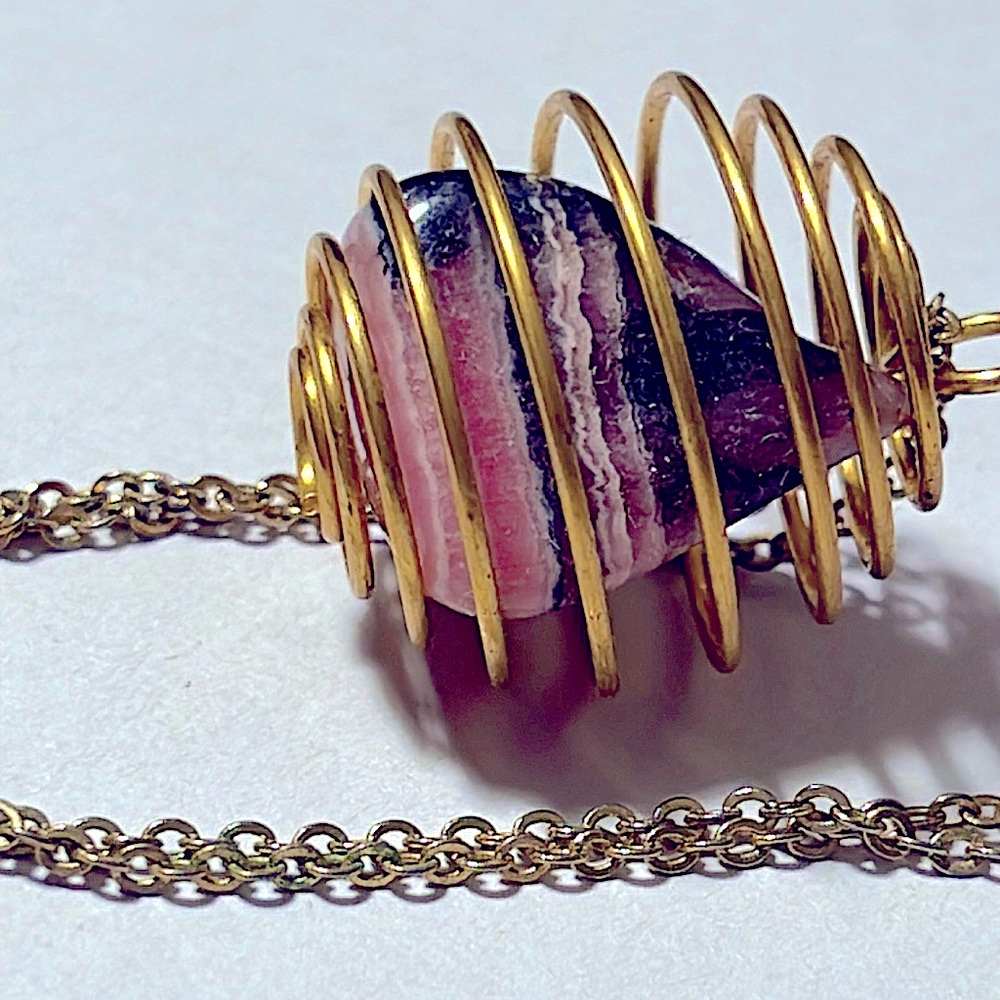 Rhodochrosite Choker Free Form in Spiral Pendant Cage